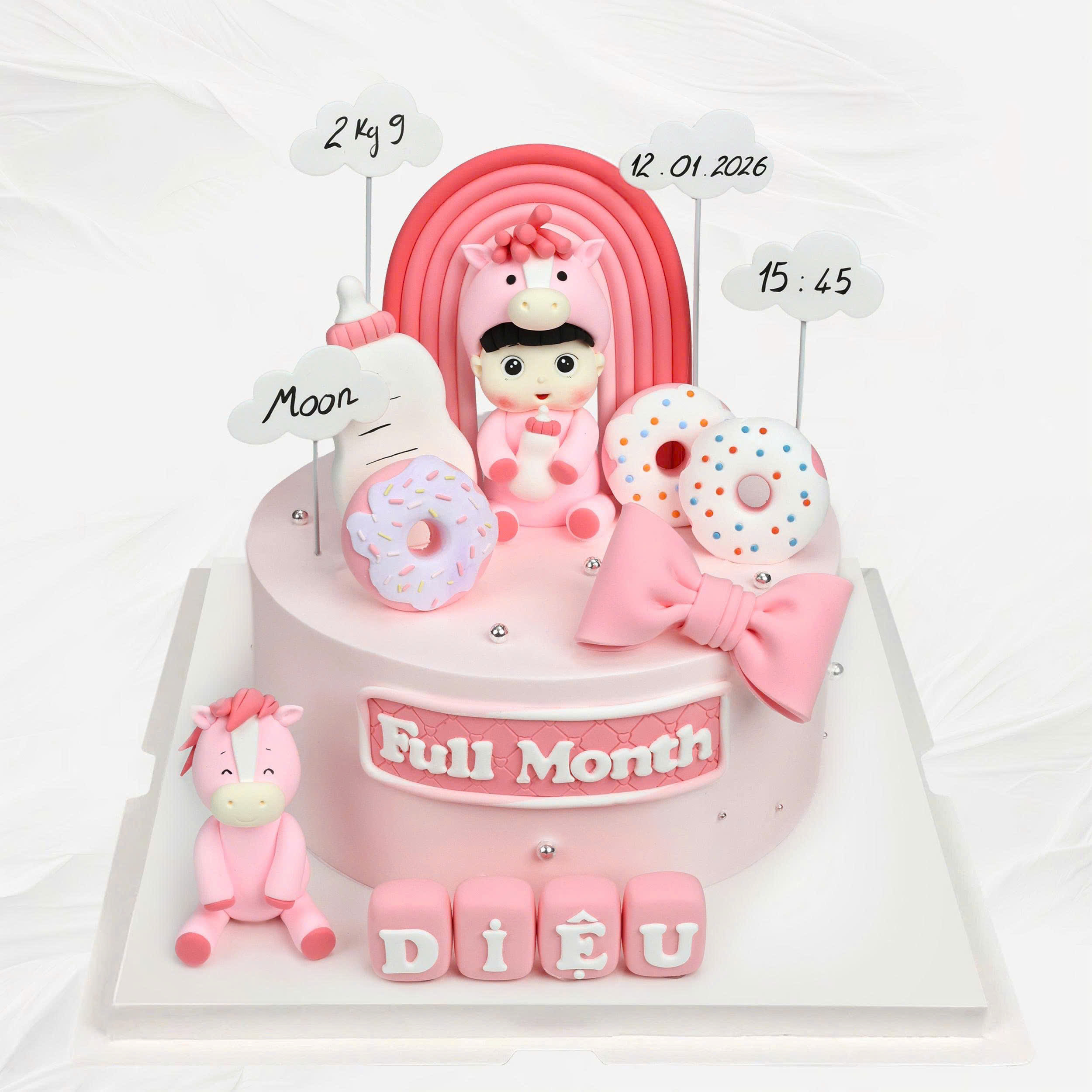 Bánh kem đầy tháng bé rắn